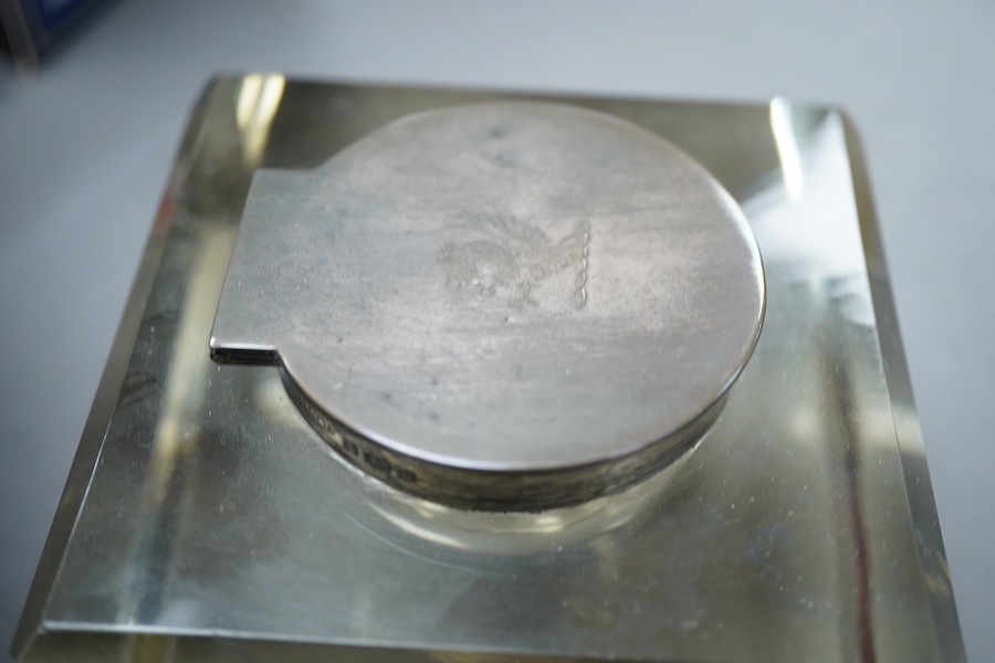 An Edwardian silver mounted cut glass square inkwell, by John Grinsell & Sons, Birmingham, 1901, width 10cm and a small silver pin dish.